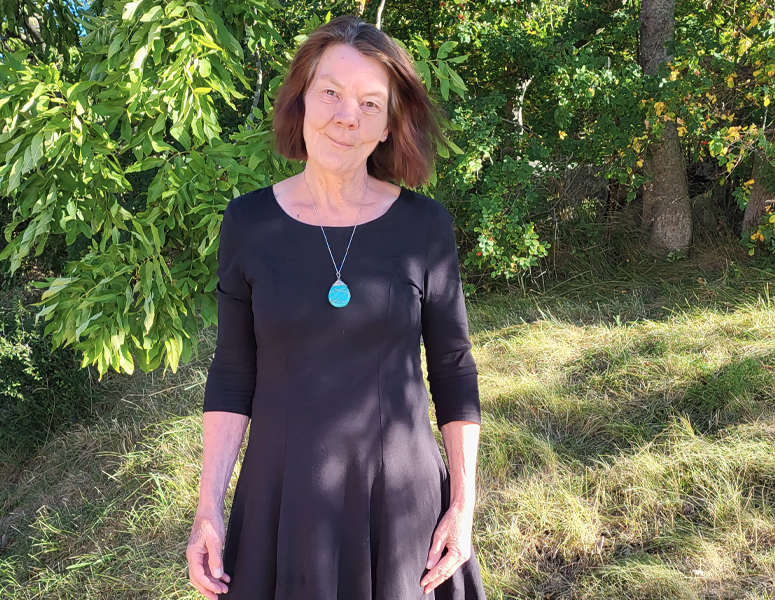 Porträttbild på Aslaug Myhrberg.