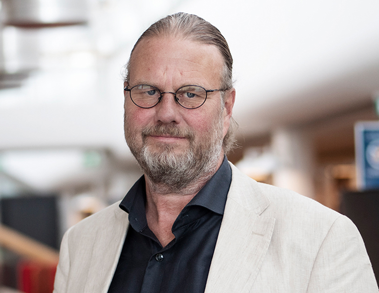 Porträttbild på Wilhelm Widmark.